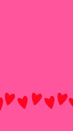 a row of red hearts on a purple background