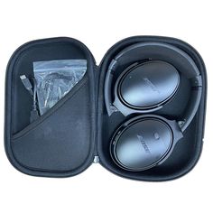 an open case with two headphones in it