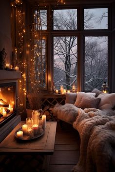 a living room filled with lots of candles next to a window covered in blankets and fur