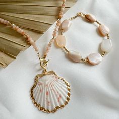 Single Strand Shell Necklace, Ideal For Gifts, Shell Single Strand Necklace For Gift, Single Strand Shell Necklace For Gifts, Single Strand Shell Necklace For Gift, Adjustable Peach Jewelry For Gifts, Spiritual Gold Shell-shaped Jewelry, Spiritual Gold Shell Jewelry, Shell-shaped Single Strand Jewelry Gift, Shell Shaped Single Strand Jewelry Gift