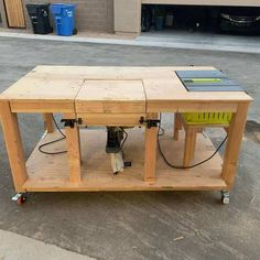 a workbench made out of wood with tools on it