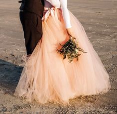 This long tulle skirt is a one size fits all with a wrap tie ribbon waistband that can be adjusted to anyone and would be ideal for a Wedding Dress or Bridesmaid Skirt. It can be made in ANY Color OR Length shown here in blush pink. The lining and waistband is of a soft satin fabric of the same or contrasting color as the tulle. Satin waistband is open in back but overlaps and wraps around to create more fullness in back and to tie in front, back or on the side. Taking Measurements- Place measur Long Gold Skirt, Beach Formal Dress, Long Skirt Formal, Tulle Skirt Wedding, Blush Tulle Skirt, Skirt Bridesmaid Dresses, Tulle Skirt Bridesmaid, Women Formal Dress, Bridesmaid Skirt