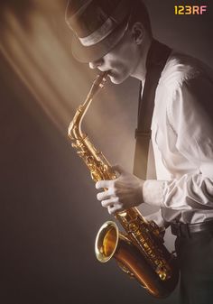 Young man playing the saxophone on a dark background. Saxophonist #music Soul On Fire, Dark Background, On Fire, Dark Backgrounds