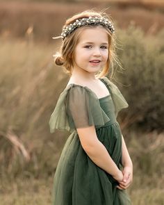 PLEASE NOTE: This item is on pre-order, with an estimated ship date of Oct. 15. Whimsical like a forest fairy, the Fawn Tulle dress in green is our latest tulle creation. The layers of tulle are so soft, while the bodice is smocked in the back for extended wear. Styled for occasions or everyday, this is a dress she's sure to love. Sizing: Sizing is true to size and flexible. Lengths below are measured from top of bodice to hem (not including sleeves). Front center length: 9-12M - 15 inches12-18M Indie Men, Indie Boy, Indie Girl, Flower Girl Dresses Tulle, Forest Fairy, Crown Hairstyles, Girls Wardrobe, Fall Photos