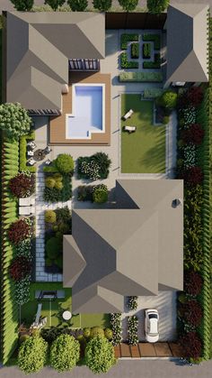 an aerial view of a house with trees and bushes on the ground, from above