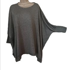 Alice + Olivia "Air" Gray Oversize Dolman Sleeve Top. Pure Comfort + Style. Soft Modal Spandex Blend With A Silk Insert In The Back. Ribbed 3/4 Cuffs. It's Marked A Small But I Think Can Be Worn By Anyone, Including During Pregnancy. Nwt $165 Oversized Solid Poncho With Batwing Sleeves, Oversized Solid Color Poncho With Batwing Sleeves, Oversized Casual Poncho With Batwing Sleeves, Casual One Size Batwing Sleeve Tops, Casual Poncho With Batwing Sleeves, Oversized Solid Color Casual Poncho, Fall Lagenlook Batwing Sleeve Tops, Casual Free Size Top With Batwing Sleeves, Casual Free Size Batwing Sleeve Tops