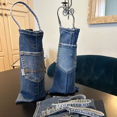 two jeans are sitting next to each other on a table