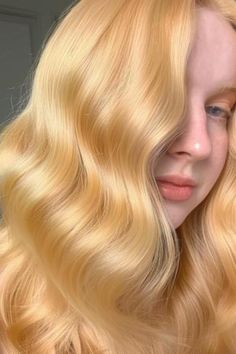 Lemon blonde is a vibrant, citrusy shade that brings a burst of brightness to your look. It complements pale skin with its lively, sunny hue. Click here to check out more best hair colors for pale skin to try. Yellow Hair Color