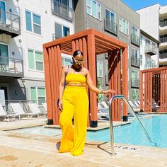 This Scrunchy Two-Piece Set Features A Strapless Crop Top And High Waist Pants. Fabric: 65% Tencel 35% Rayon Color: Yellow Strapless Stretch Jumpsuit For Spring Beach, Spring Beach Strapless Stretch Jumpsuit, Sleeveless Tube Top For Poolside Spring, Spring Sleeveless Tube Top For Poolside, Chic Summer Tube Top For Poolside, Spring Poolside Tube Top, Spring Bandeau Strapless Jumpsuit For Day Out, Chic Bandeau Bottoms For Poolside, Chic Yellow Tube Top For The Beach