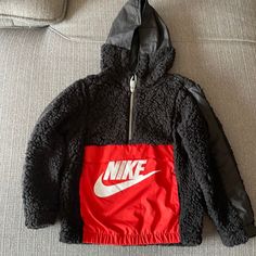 Nike 7 Year’s Old Sweatshirt. Soft And Cool Top! Never Worn Winter School Fleece Tops, Fleece Tops For School In Winter, Nike Letter Print Top For Winter, Nike Tops With Letter Print For Winter, Red Nike Hooded Top, Black Sporty Sweatshirt For School, Old Sweatshirt, Tops Nike, Boys Sweatshirts