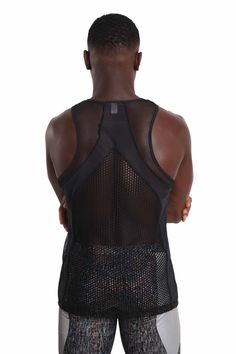 Perfect for those hot summer days and late-night dance parties, this mens mesh tank top features paneling in different mesh fabrics for a unique, eye-catching look. Crafted from high-quality, super breathable mesh materials, this see through fishnet top will keep you cool and comfortable all day (and night) long. The black color gives it a sleek and versatile appearance, while the mixed mesh paneling adds a touch of edginess and style. Whether you're looking to stand out in the crowd or just wan Fishnet Tank Top, Mesh Fabrics, Design Perspective, Gloves Dress, Festival Outfits Men, Dance Parties, Fishnet Top, Mesh Tank Top, Black Fishnets