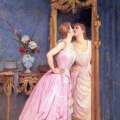 two women are kissing in front of a mirror