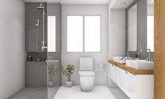 a modern bathroom with two sinks and a toilet