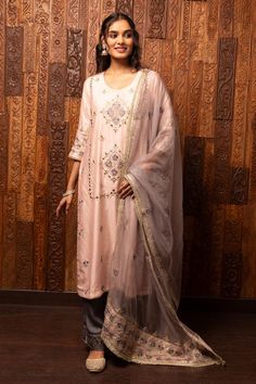 Light pink silk chanderi kurta with embroidered floral patterns. Comes with viscose dupion embroidered contrast pant and embroidered organza dupatta.
Components: 3
Pattern: Embroidered
Type Of Work: Floral
Neckline: U neck
Sleeve Type: Three Quarter
Fabric: Kurta - Silk chanderi, Pant - Viscose dupion, Dupatta - Organza
Color: Pink
Other Details: 
Attached lining
Model Height: 5ft 7inches, wearing size M
Weight: 4000 gms
Occasion: Puja - Aza Fashions Woven Shawls, Pink Kurta, Dress Salwar Kameez, Embroidered Organza, Organza Dupatta, Types Of Work, Bollywood Saree, U Neck, Pink Silk