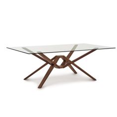 a glass table with wooden legs on a white background