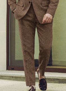 Unveil a legacy of style with our Harris Tweed Irish Brown Herringbone Suit, blending rugged charm with refined tailoring. Fashioned from pure wool, this suit features a herringbone weave that showcases a rich blend of earthy brown tones with intricate texture. The subtle pattern exudes timeless elegance, making it the perfect choice for any occasion. Whether you're attending a countryside wedding or stepping into a high-powered meeting, this suit ensures you stand out with confidence and class.  Look Includes    Harris Tweed Irish Brown Herringbone Fabric  Two Button Jacket Style  Notch Lapel   Horn   Brown  Buttons  Single Vent  Three Cuff Buttons  Two Welted Back Pockets on Trousers    Click 'Customize Now' to modify the look if needed.   Lining: Viscose, Dry Clean. Timeless Tweed Suit With Welt Pockets, Semi-formal Fall Herringbone Suit, Brown Wool Suit With Herringbone Pattern, Wool Suits With Herringbone Pattern For Business Casual, Classic Wool Suits With Herringbone Pattern, Winter Tweed Three-piece Business Suit, Winter Business Tweed Three-piece Suit, Winter Tweed Three-piece Suit For Business, Brown Herringbone Suits For Business Casual