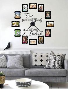 a living room with a couch, table and clock on the wall that says time spent with family is always second