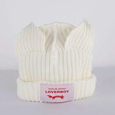 a white hat with the word loveboy on it's front and back side