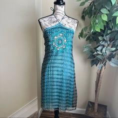 Be The Star Of The Party With This Gorgeous Bejeweled Halter Dress In Blue By Jo Rivaaz In Size Medium. Pair With Heels. Originally From India, Nwt - You Can Throw On Leggings To Make It Into A Indian Outfit Or Keep It As Is For An Exotic Look. Perfect For Summer Events. Details: Lined Halter Neck Line With Tie Bejeweled Torso Falls To Knees Nwt Measurements (Taken Flat): Chest (Pit To Pit): 18.75” Waist: 16” Hips: 20.25” Hem: 23” Length (Chest To Hem): 34” Missing Material Tag Smoke Free, Pet F Embellished Halter Neck Beach Dress, Blue Sequin Halter Neck Dress, Blue Sequined Beach Dress, Blue Sequin Beach Dress, Blue Sequined Dresses For Festive Occasions, Elegant Blue Dress For Festival, Elegant Blue Festival Dress, Festive Blue Embellished Dress, Blue Beaded Dress For Night Out