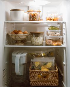 an open refrigerator filled with lots of food