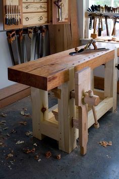 a wooden workbench sitting on top of a table