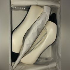 Chanel Ivory/Black Pearl Heeled Pumps. Bnib. Includes Dust Bag, Authenticity Certificate. Classic White Court Shoes With 4-inch Heel, Chic White Patent Leather Court Shoes, White Patent Leather Court Shoes For Office, Cream Heels With Contrasting Heel Counter For Evening, Classic Cream Patent Leather Heels, Luxury Cream Low Heel Shoes, Luxury Cream Low Heel Heels, Luxury Low Heel Cream Heels, Classic White Court Shoes With Padded Heel