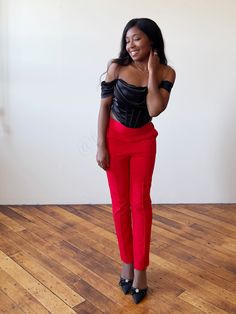 Why You'll Love It Deep, rich red straight-leg trousers with lining that provide perfect coverage so that you don't have to worry about panty liners or wrinkles when tucking in shirts or sweaters Pintuck straight-leg cut for a sleek and elongated sophisticated look An a-line waist with an elastic band waist for a tapered look that provides a lot of stretch for a tapered look. Fabric: Self: 70% Rayon, 25% Polyester, 5% Spandex | Lining: 95% Polyester, 5% Spandex Model Specs: Bust: 33" Waist: 28" Red High Waist Bottoms For Going Out, Fitted Trousers For Going Out, Red Stretch Straight Leg Pants, High Waist Fitted Pants For Date Night, Fitted High Waist Pants For Date Night, Chic Red Bottoms For Going Out, Stretch Straight Leg Pants For Date Night, Fitted Straight Leg Bottoms For Date Night, Trendy Fitted Pants For Formal Occasions