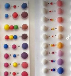 there are two rows of different colored balls on the wall and one row is white