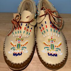 No Size Is Listed Mint Condition, Some Slight Markings On Bottom But Don’t Believe They Have Ever Actually Been Worn Elevate Your Shoe Game With These Toas Authenic Buckskin Leather Native American Beaded Moccasins. Crafted With Care, These Flats Boast A Unique Combination Of Style And Comfort. The Cushioned Insole And Lightweight Design Make Them Perfect For All-Day Wear. The Brown Leather Upper Material Is Accented With Beautiful Beading, Adding A Touch Of Elegance To Any Outfit. These Vintage Navajo Moccasins, Beaded Moccasins, American Theme, Native American Beading, Bead Work Jewelry, Shoe Game, Moccasins, Mint Condition, Native American