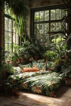 a room filled with lots of plants and windows