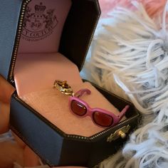 Never Worn Juicy Couture Gold And Pink Enameled Charm. Charm Has Articulating Arms That Open And Close Like Really Sunnies. The Lenses On The Sunglasses Are Tinted Dark Amber That Catches The Light And Are Somewhat Transparent. This Charm Is Rare And Retired. Offers Welcome! Thank You! Trendy Pink Jewelry For Formal Occasions, Trendy Pink Glass Jewelry, Juicy Charms, Juicy Couture Necklace Heart, Juicy Couture Charm Necklace, Juicy Couture Jewelry Necklaces, Couture Sunglasses, Juicy Cotoure Charm Bracelet, Juicy Couture Charms Bracelet