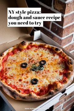 a pizza sitting in a box on top of a table