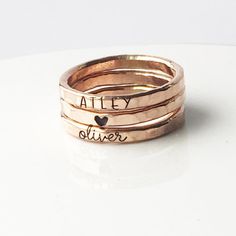 Cursive Name Ring Pink Gold Filled, cursive name ring, cursive font name ring, Stacking Ring, Stacked Rings, Stacking Name Rings, Rose Gold Filled Stacking Name Ring, Mom Gift, Gift for New Mom, Mother's Day Gift, Christmas Gift for mom, Christmas Gift for Wife, Personalized Mom Gift, Personalized Wife Gift Mother's Day Gifts, Mom Rings, Yellow Gold Filled Name Rings, Set of Rings, Mother Rings These rings are handmade in our Indiana studio. Each engraved ring starts from a spool of wire. They a Antique Wedding Jewelry, Heart Ring Gold, Stackable Name Rings, Ring With Heart, Vintage Engagement Ring Settings, Moissanite Engagement Ring White Gold, Moissanite Engagement Ring Rose Gold, Gold Leaf Rings, Rose Gold Diamond Ring Engagement