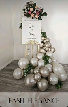 Easel Elegance - For an entry like no other! 

This gorgeous balloon arrangement is most certainly an elegant display to welcome your guests. 

Want this style at your next event? Whether it being a baby shower, bridal shower or wedding, enquire now at balloonsnbeyond.com.au. 

Happily offering our services around greater Newcastle & surrounds. 

#balloonsnbeyondau #bride #wedding #celebration #party #babyshower #balloons #balloonarrangement #flowers #balloondecor #Newcastle #Sydney #easel Easel With Balloons, Balloon Easel, Decor Statement Pieces, Wedding Celebration Party, Balloon Arrangement, Balloon Gifts, Balloon Frame, Newcastle Nsw, Personalized Balloons