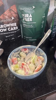 a bowl filled with food sitting on top of a counter