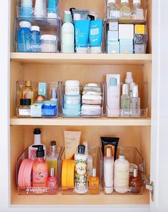 the shelves are filled with many different types of beauty products and personal care items in plastic containers