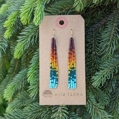 The same beaded fringe earrings you love in a shorter style. Perfect for those days when you are more active, out exploring nature! This unique rainbow color effect is inspired by a vibrant sunset over the ocean. These earrings are very lightweight. A more playful, free flowing option to studs. Featuring 4 strands of hand woven matte glass beads. These unique matte glass beads have a very luxe look and feel to them. Colors: These beaded earrings feature an ombre fade of semi-transparent purple, matte terra cotta, mustard yellow, semi-transparent teal & turquoise glass beads. Length: Approximately 3" drop length Metal Options: Available in 14k gold fill or sterling silver. (Gold-filled jewelry has 100x more gold alloy than gold plated and because that layer is so much thicker, it means gold Fun Multicolor Beaded Earrings, Rectangle Beaded Earrings, Multicolor Beaded Earrings With Dangling Beads For Everyday, Multicolor Dangling Beads Earrings For Everyday, Everyday Multicolor Beaded Earrings With Dangling Beads, Everyday Multicolor Beaded Dangling Earrings, Rainbow Seed Bead Earrings, Bohemian Rainbow Beaded Earrings For Beach, Silver Beaded Earrings