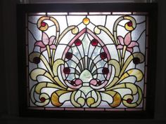 a close up of a stained glass window