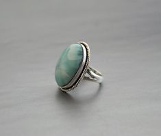 Description Larimar ring, Sterling Silver Rings for women, Blue Gemstone Ring, anniversary gift, Promise ring, Statement Ring, Art Deco ring, Antique✦Gemstone: Natural Larimar✦Stone Cut: Oval Cabochon✦Stone Size: Approximately 13X18 mm Oval✦Metal: 925 Sterling Silver Natural stones may vary slightly in shape, size and color.Handmade ItemYou will receive the same piece as in the picture or identical. Since all gemstones are different from each other, I cannot guarantee that the gemstone you see a Stamped 925 Larimar Rings As A Gift, Adjustable Larimar Jewelry For Anniversary, Wedding Larimar Gemstone Rings, Adjustable Larimar Rings As Gift, Round Larimar Rings As A Gift, Jewlery Rings, Blue Gemstone Ring, Silver Jewlery, Silver Rings For Women