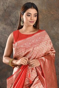 Be vision of elegance on special occasions in this traditional red silk saree. The saree is enhanced with overall heavy zari work. It comes with a matching blouse piece. Disclaimer: The shown stitched blouse on the model is for display purpose only. The saree comes with a matching blouse piece and finished with fall and piko. Red Silk Saree, Sarees Banarasi, Fashion Journals, Banarasi Saree, Indian Saree, Zari Work, Traditional Fabric, Silk Sarees Online, Saree Online