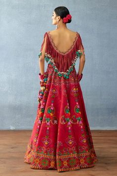 Red attached cancan lehenga with floral print and side pompom tassels. Paired with a fringed blouse with dangling cowrie shell details. - Aza Fashions Lehenga And Blouse, Lehenga Pattern, Fringe Blouse, Indian Textiles, Casual Styles, Indian Clothing, Traditional Wear, Indian Design, Indian Sarees