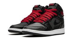 The Air Jordan 1 GS “Black Satin” is the youth sizing of lifestyle-focused high-top featuring a premium finish applied to its upper.  Now firmly entrenched as one of streetwear’s most essential styles, the high-top Jordan 1 is more at home on the streets than the courts these days, and the materials used on this colorway speak to that sentiment.  A black satin material is applied to the toe, mid-panel and collar.  Black leather overlays appear on the forefoot, toe cap, collar and heel.  Tonal si High Top Jordans, Jordan 1 Black, Red Jordans, Jordan Retro 1, Nike Air Jordan Retro, Air Jordan 1 Retro High Og, Air Jordan 1 Retro High, Air Jordan 1 High, Kids Jordans