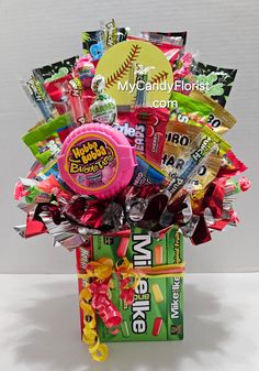 a baseball themed candy bouquet in a box