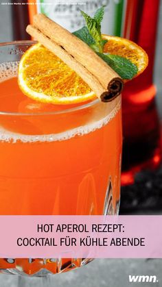 an orange drink with cinnamon garnish on the rim