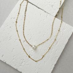 Gold Layered Necklaces, set of 2 necklaces - Goldfilled necklace with one natural pearl and a gold-filled chain necklace.2 separate necklaces so you can wear each necklace separately or together as a layered.Adjustable necklaces - each necklace comes with a 2" extension chain.♥ Necklaces length are 15 inches + 2" extension chain.If you wish for a different size contact us.♥ This necklace set is our recommendation for a Bridesmaid Gift.♥ Comes in a beautiful package ready for gifting. Dainty Pearl Necklace For Layering With Pearl Chain, Dainty Pearl Necklace For Layering, Gold Delicate Chain Layered Necklace With Pearls, Minimalist Pearl Pendant Necklace For Layering, Layering Pearl Necklace With Delicate Chain, Delicate Pearl Necklace For Layering, Minimalist Double Strand Pearl Chain Necklace, Gold Double Strand Pearl Necklace With Adjustable Chain, Multi-strand Pearl Drop Necklace As Gift