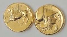 an ancient gold coin with two horses on it