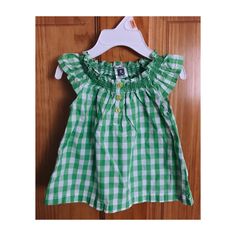 Worn Only Once! These Green And White Gingham Tops Are Carter’s Brand For Little Girls Size 9 Months. They Are Absolutely Adorable And Perfect For The Spring Cute Little Yellow Button Details Down The Front. Two Available!! Open To Offers & Bundles!!! Nwt Kids’ Shoes (In Closet) May Be Added To This Purchase For An Additional 2 Dollars Cute Cotton Plaid Tops, Cute Plaid Cotton Tops, Cute Short Sleeve Plaid Tops, Cute Plaid Short Sleeve Tops, Green Ruffled Tops For Playtime, Playful Plaid Summer Tops, Cute Plaid Ruffled Tops, Spring Gingham V-neck Top, Kids Gingham Shirt