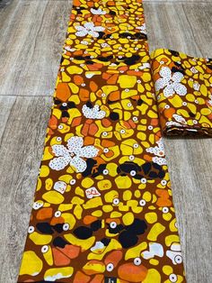 This vibrant and intricately patterned Ankara fabric is a true representation of Nigerian craftsmanship. Sourced directly from Lagos, this fabric is made from 100% high-quality cotton, ensuring durability, softness, and breathability. The rich, colorful designs are perfect for making various project. Vibrant Patterned Ankara Fabric, Ankara Fabric, Ankara, Wedding Shop, Shop House, High Quality, Color Design, Pet Supplies, Electronic Accessories