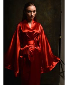 Ankle length, wrap-over style, with two sets of inside ties. One tie is included. Material Composition: polyamide 60%, viscose 20%, polyester 10%, silk 7%, elastane 3% Red Silk Robe, Women Silk Robe, Long Silk Kimono, Satin Dressing Gown, Luxury Robes, Red Kimono, Sheer Robe, Draped Sleeves, Silk Kimono Robe