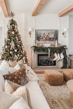 Pottery Barn Christmas, gingerbread Christmas, living room style, cozy Christmas vibes, warm woods, creamy whites, velvet ribbon, stocking finds, garland finds, throw pillow, pouf finds, frame tv art, gold detail, gingerbread house, Christmas tree finds, tree topper, neutral area rug, tree topper, wall sconce, neutral gingerbread Christmas, light and bright, neutral aesthetic, chunky throw blanket, gingerbread pillow, furniture faves, warm browns Brown Ribbon Christmas Decor, Gingerbread Neutral Christmas Decor, Christmas Tree Near Fireplace, Warm Gingerbread Christmas Tree, Christmas Mantel Inspiration, Tv Garland Christmas, Christmas Wall Garland, Where To Put Christmas Tree Living Rooms, Gingerbread Living Room Decor